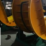 10 ton capacity coil tilter for efficient coil handling and transfer.