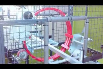 Compact orbital wrapping machine for efficient packaging and storage solutions.